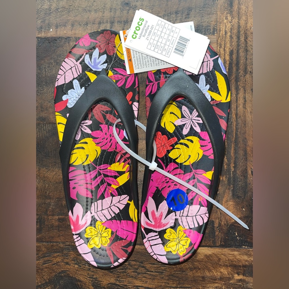Crocs women’s size 10 Colorful Floral Flip Flops